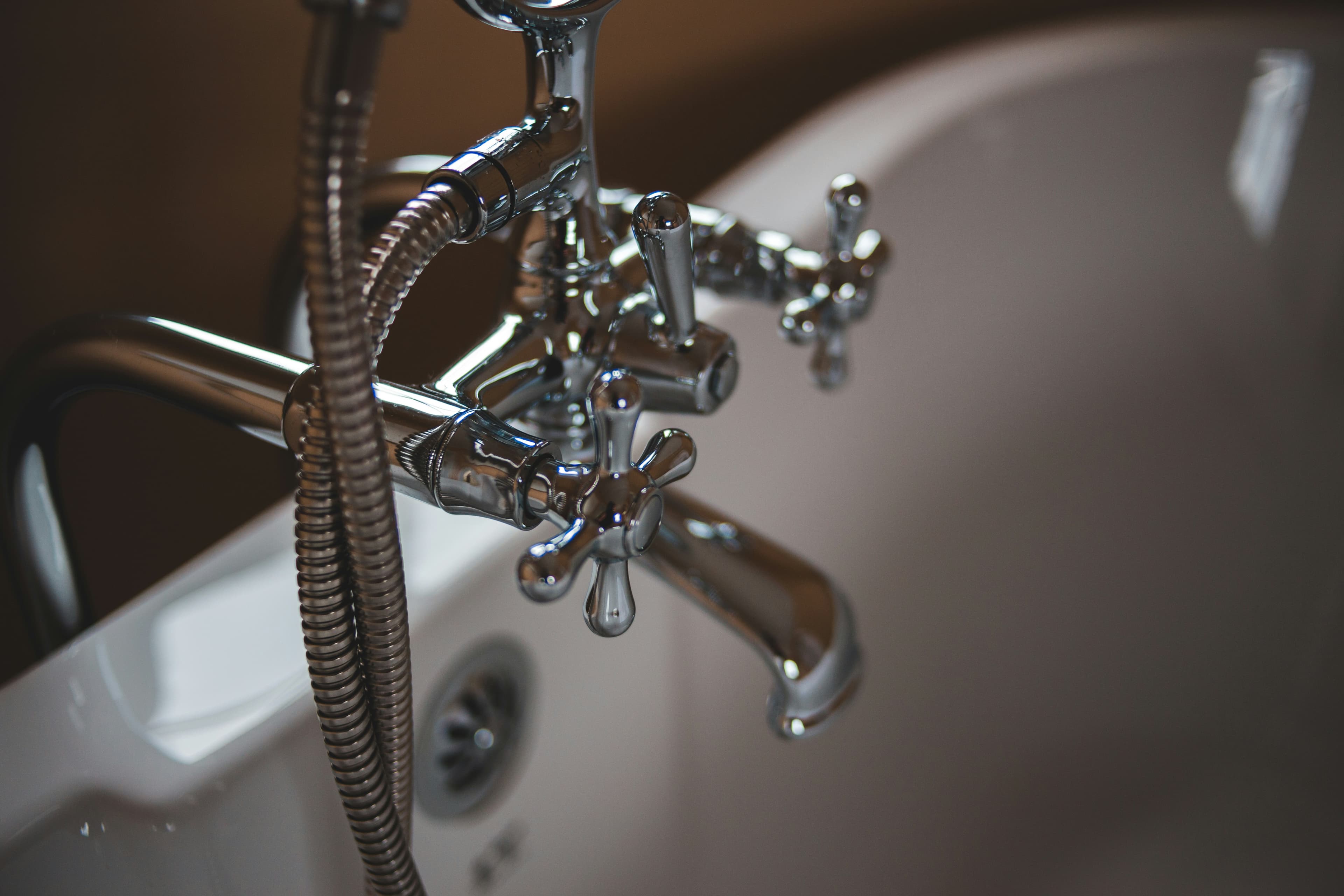 Licensed plumber performing fixture installation and water heater services in Charlotte, North Carolina